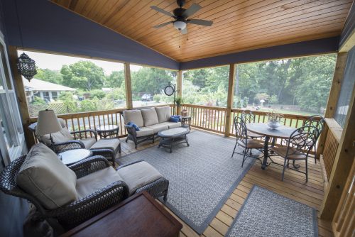 The screen porch is accessible from the new living room and new master bedroom.